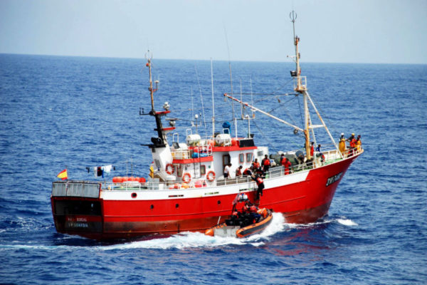 US and Cape Verde coast guard and judiciary police embark a fishing boat