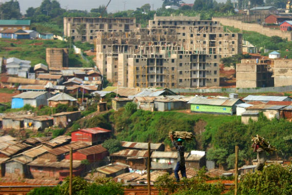 Kibera slum with condos in the background