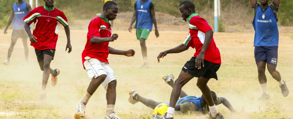 Senegal and Burkina Faso soldiers play soccer