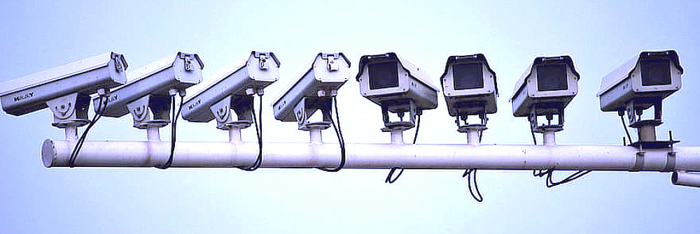 Row of surveillance cameras