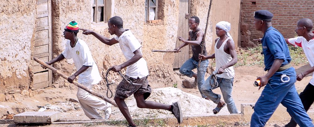 The Burundi ruling party's youth militia—the Imbonerakure—chasing opposition protesters in the presence of police in May 2015.