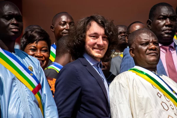 Dimitry Sytii with CAR deputies on the steps of the National Assembly in Bangui on October 15, 2021