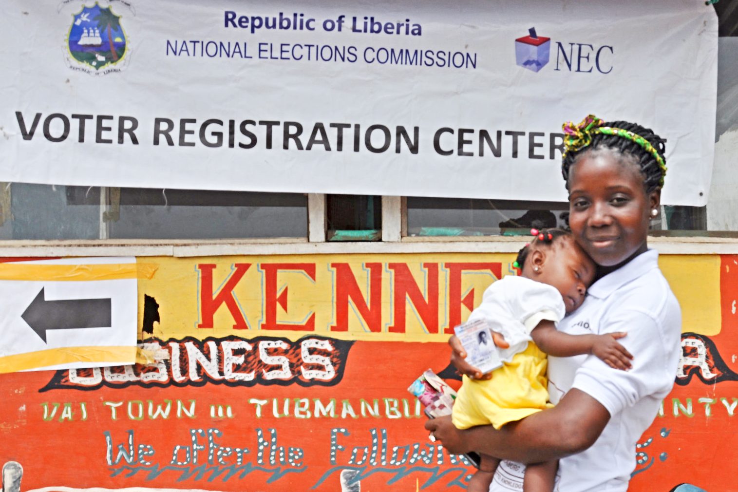 A young Liberian woman outside a voter registration center