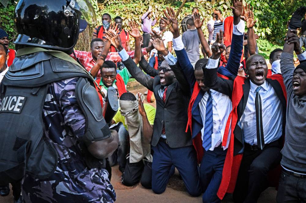 Students of Makerere University in Uganda protest against removing presidential age limits from the constitution.
