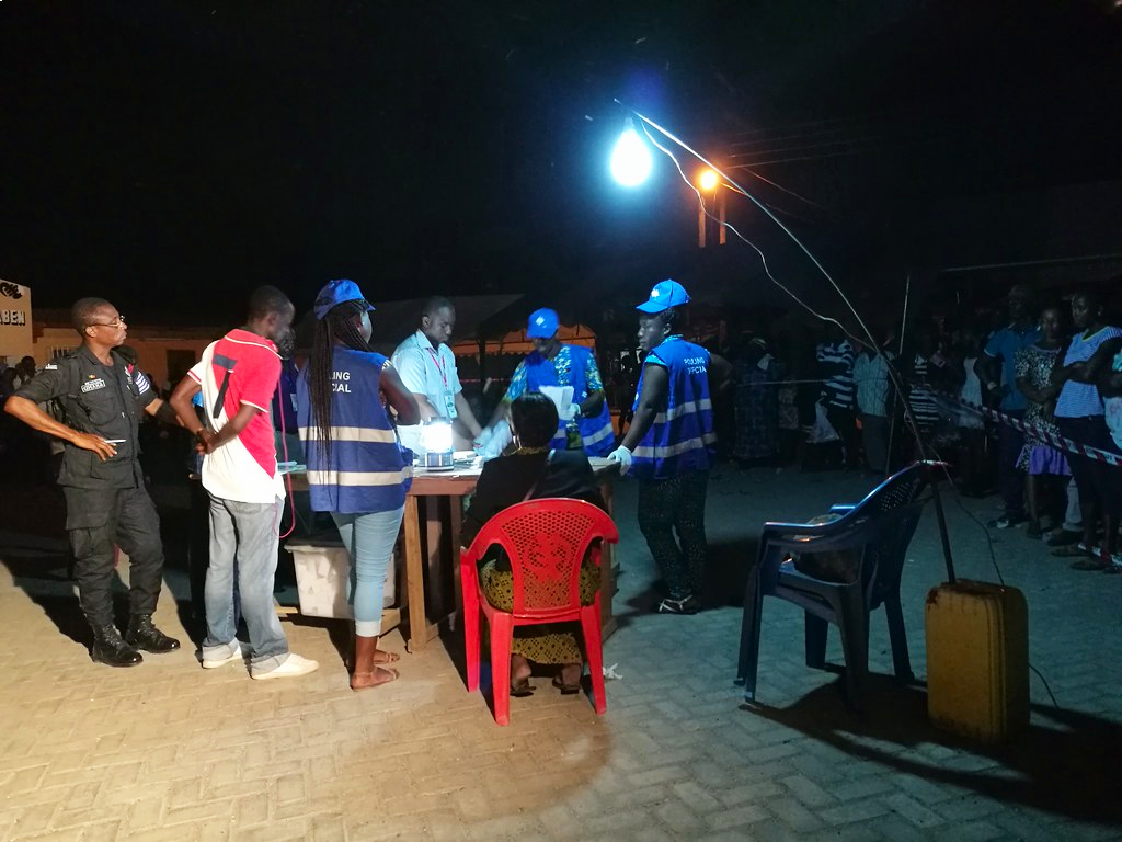 Vote counting at a polling station during Ghana's 2016 elections. 