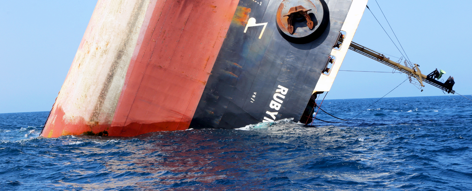 The shipping vessel Rubymar capsizing in the Red Sea after a Houthi missile attack.
