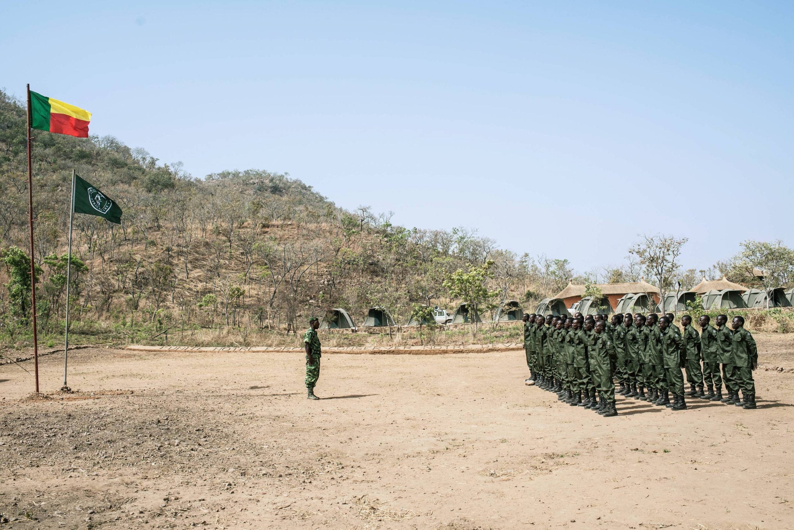 Security forces stand at attention during a graduation ceremony in northern Benin.