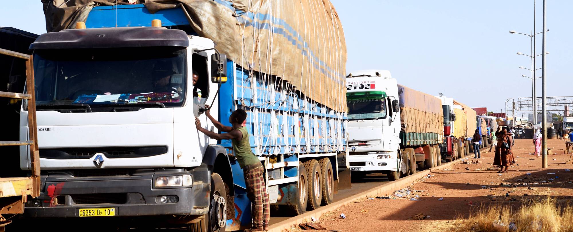A line of trucks in Togo, waiting to cross the border into Burkina Faso