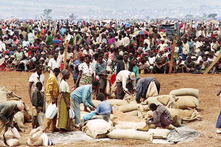Rwandan refugees waiting to get food from the Red Cross in the Benako, Tanzania refugee camp in 1994.