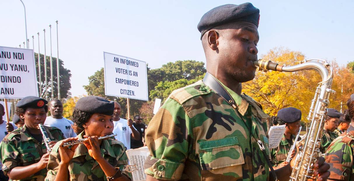 Malawi Electoral Commission staff, accredited civil society organisations, members of the public, and members of the Malawi Defense Forces military band march in Lilongwe to mark the official beginning of the electoral period ahead of the 2025 Malawi General Elections. (Photo: AFP/Amos Gumulira)