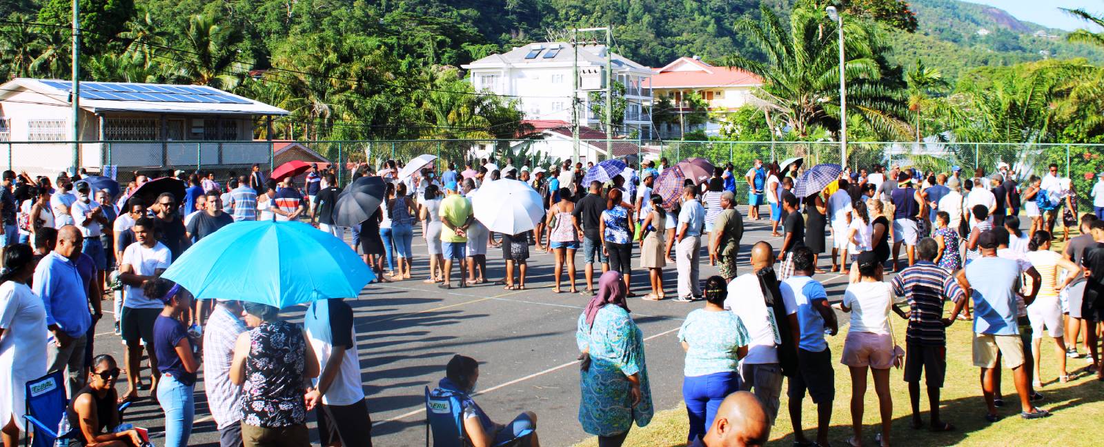 Voters queue at a polling station on the main Island of the Seychelles, on October 24, 2020, during the presidential and legislative elections. (Photo: AFP/Rassin Vannier)