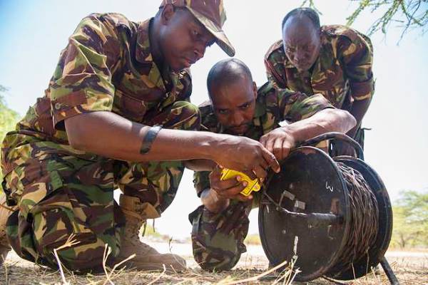 KDF combat engineers practice setting up an electric demolition with mock training aids